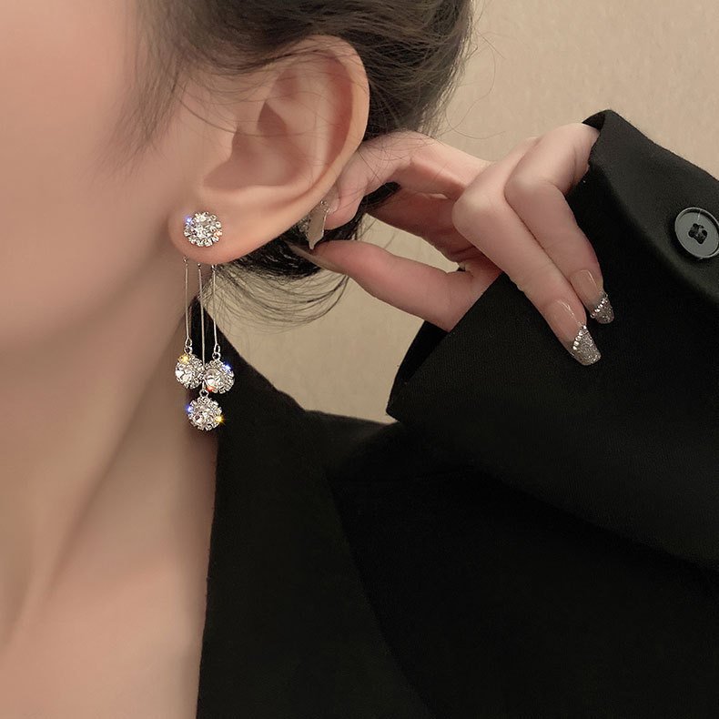 Pendientes chapados en oro Tríada de Circonitas