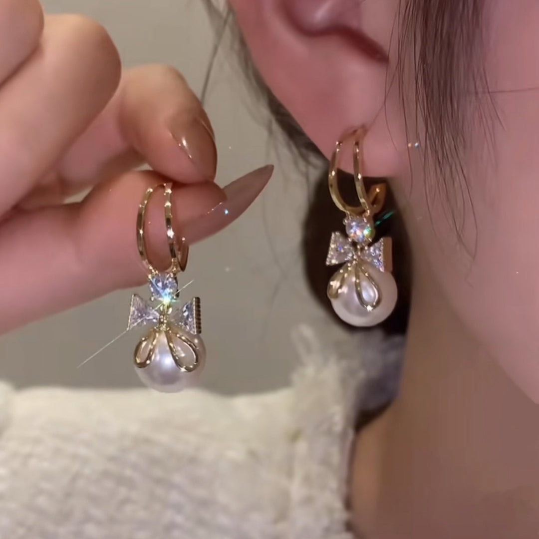 Pendientes de doble lazo con perlas
