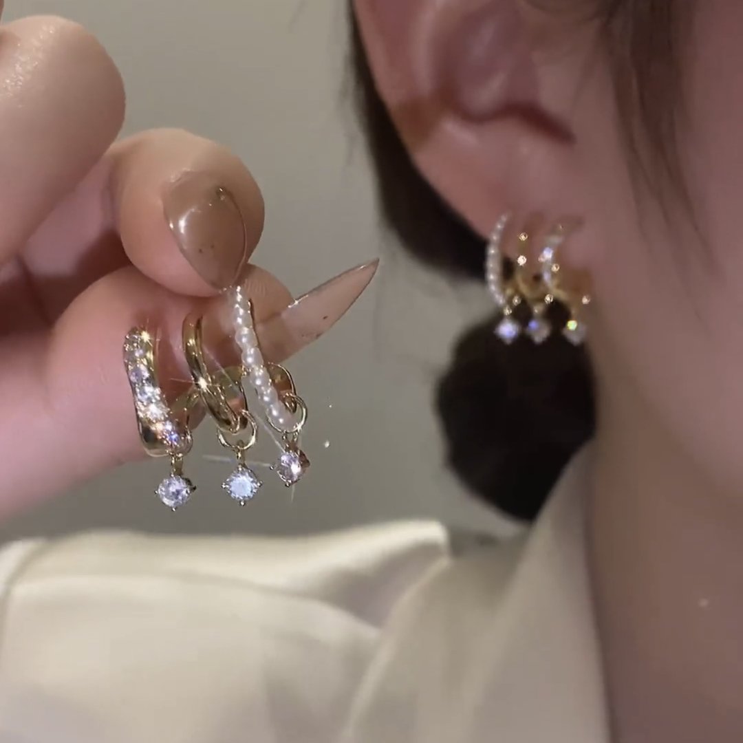 Pendientes superpuestos con circonitas incrustadas