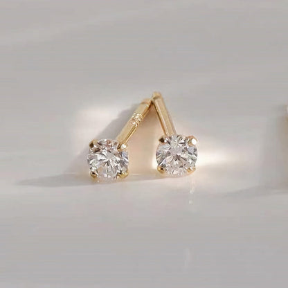 Pendientes pequeños de tapón dorados Zeke