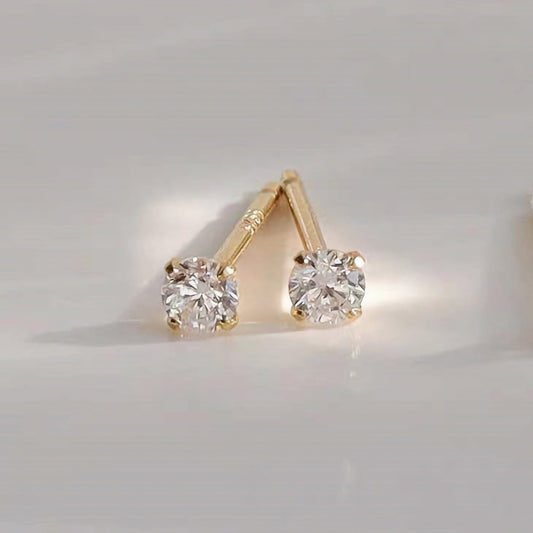 Pendientes pequeños de tapón dorados Zeke