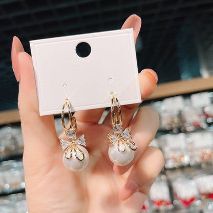 Pendientes de doble lazo con perlas