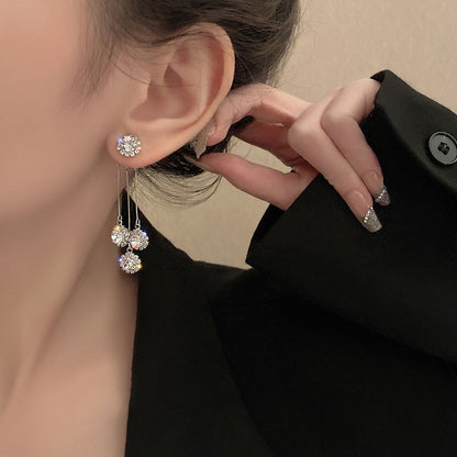 Pendientes chapados en oro Tríada de Circonitas