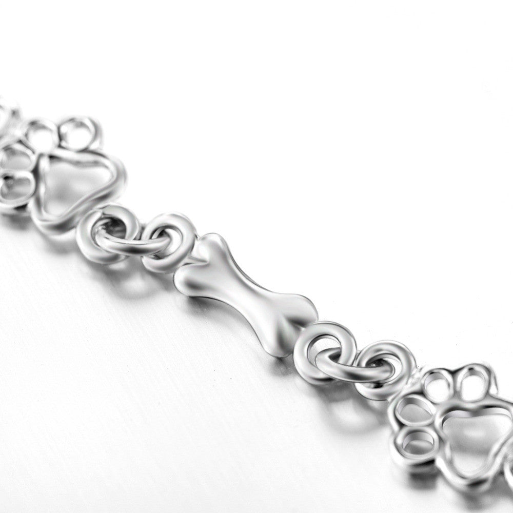Pulsera de Brazaletes de Pata de Perro y Hueso en Plata Pura