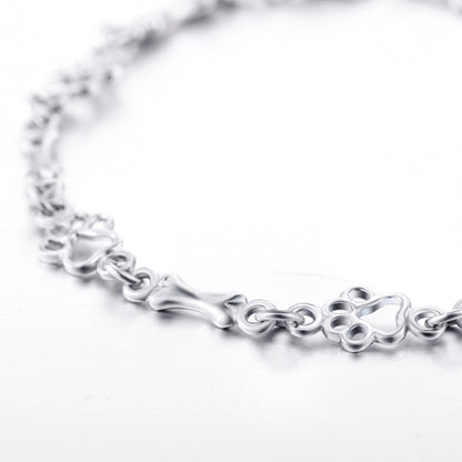 Pulsera de Brazaletes de Pata de Perro y Hueso en Plata Pura