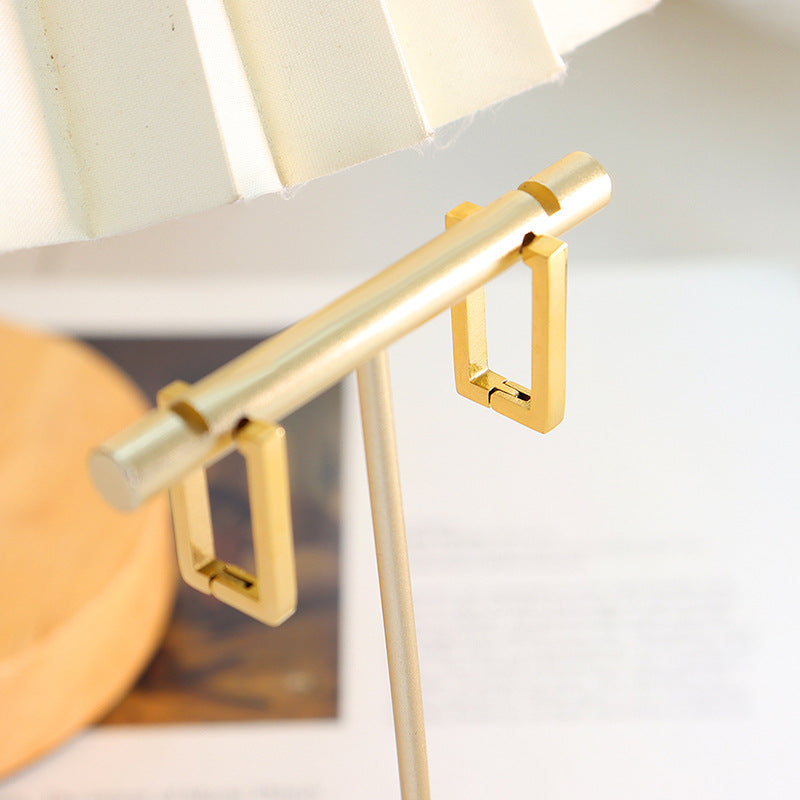 Pendientes geométricos dorados Terra