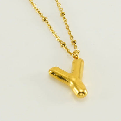 Collar especial de luz dorado de 18 quilates con esfera especial y letra inicial