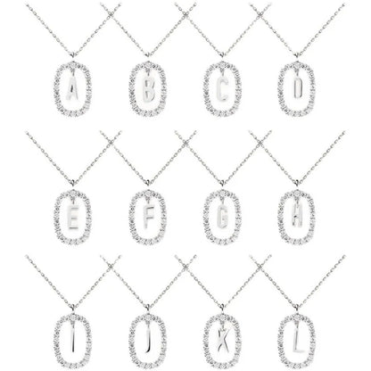 Cadena de letras dorada de 18 quilates con piedras preciosas brillantes