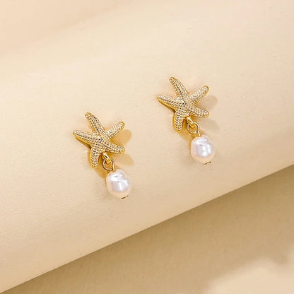 Pendientes Estrella de Mar con Borla de Perla Elegante