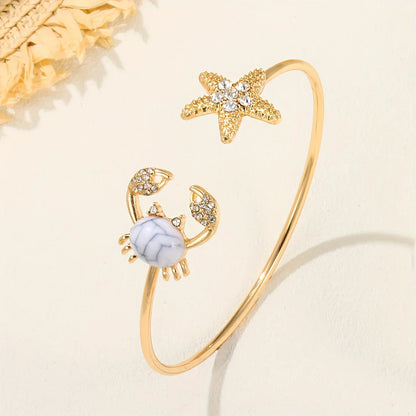 Anillo Dorado de Cancrejo Ajustable con Perla Incrustada