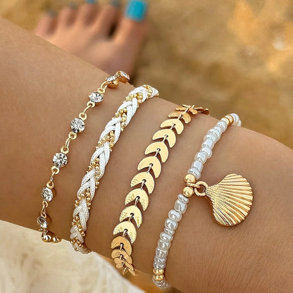 Conjunto de 4 Pulseras Elegantes con Concha Dorada