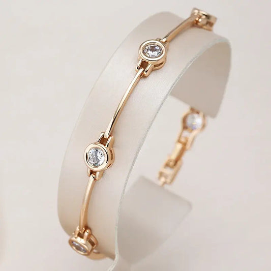 Elegante pulsera con circonitas en oro